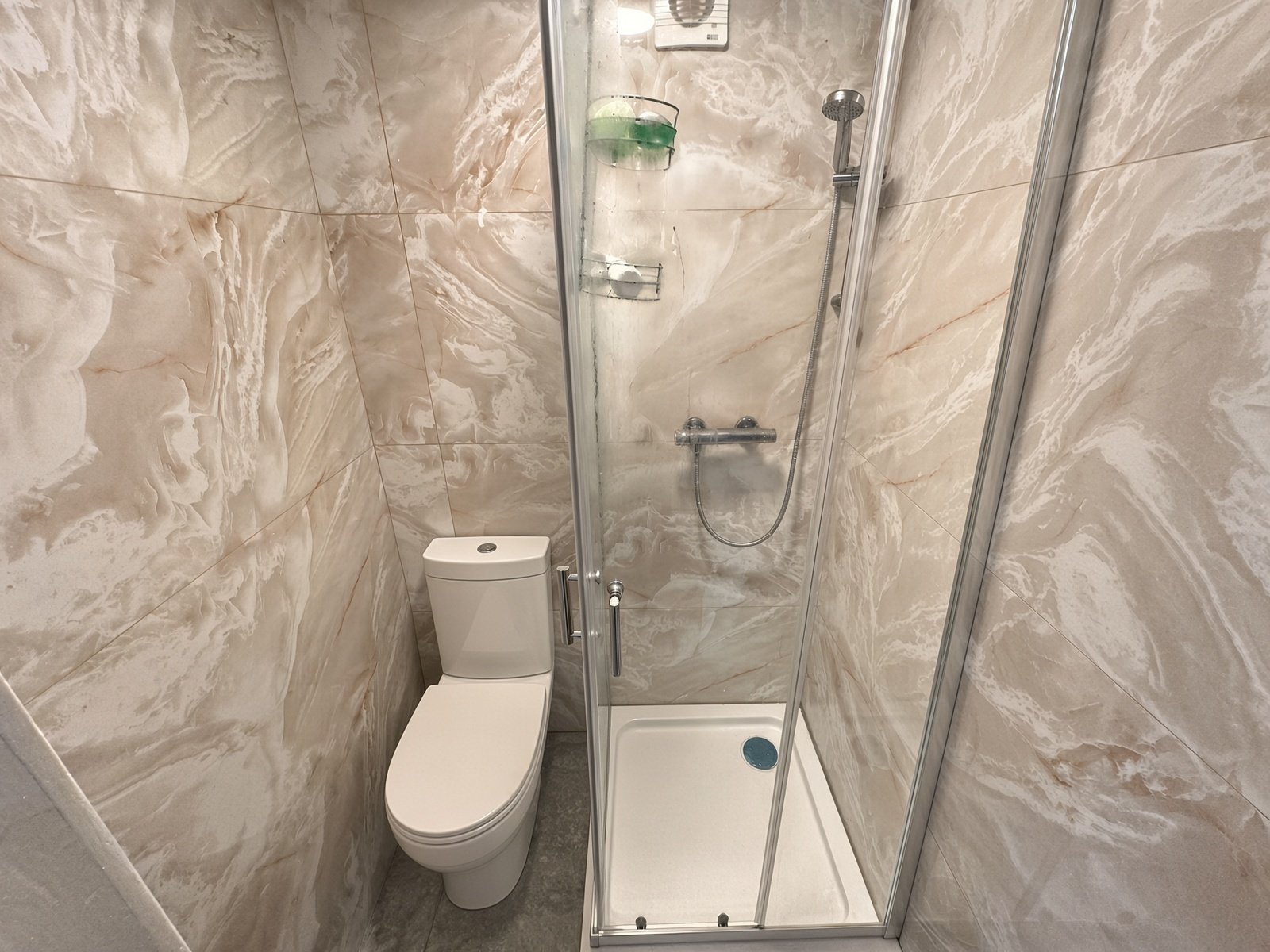 Shower room with corner shower and WC