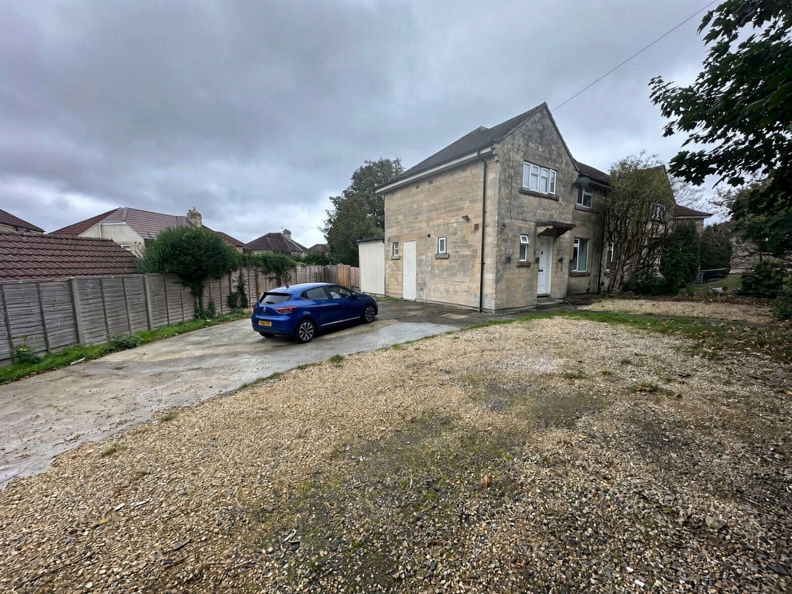 Private parking area beside the house