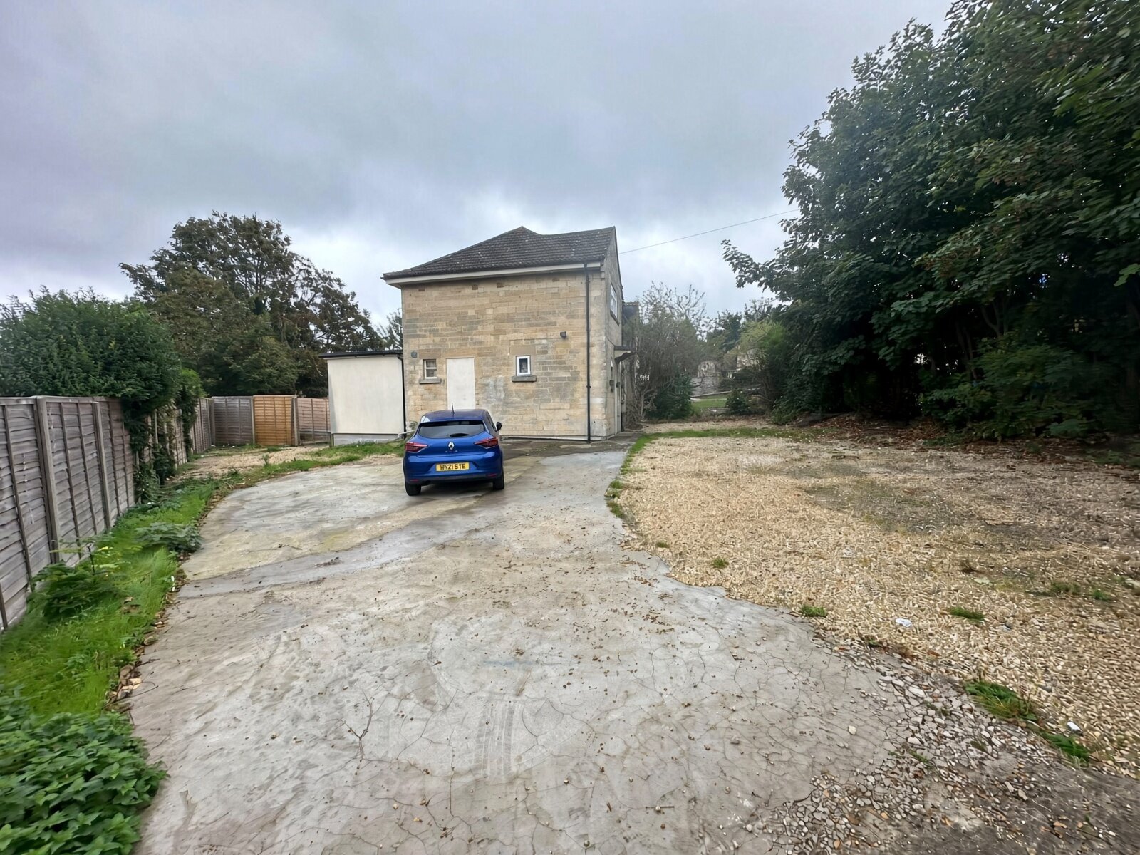 Driveway and parking area leading to the house