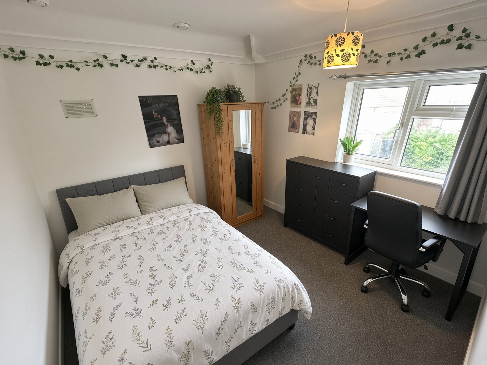 Bedroom with double bed, desk and window