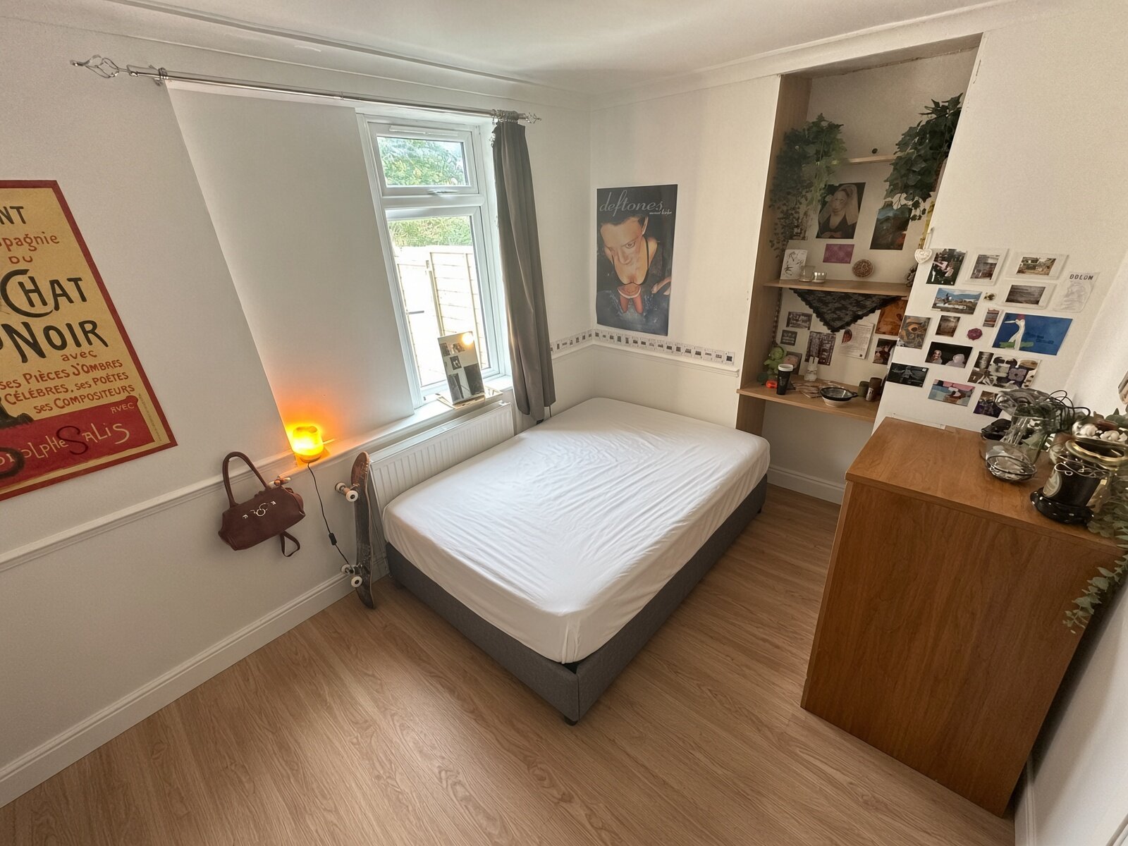 Bedroom with double bed, chest of drawers and window