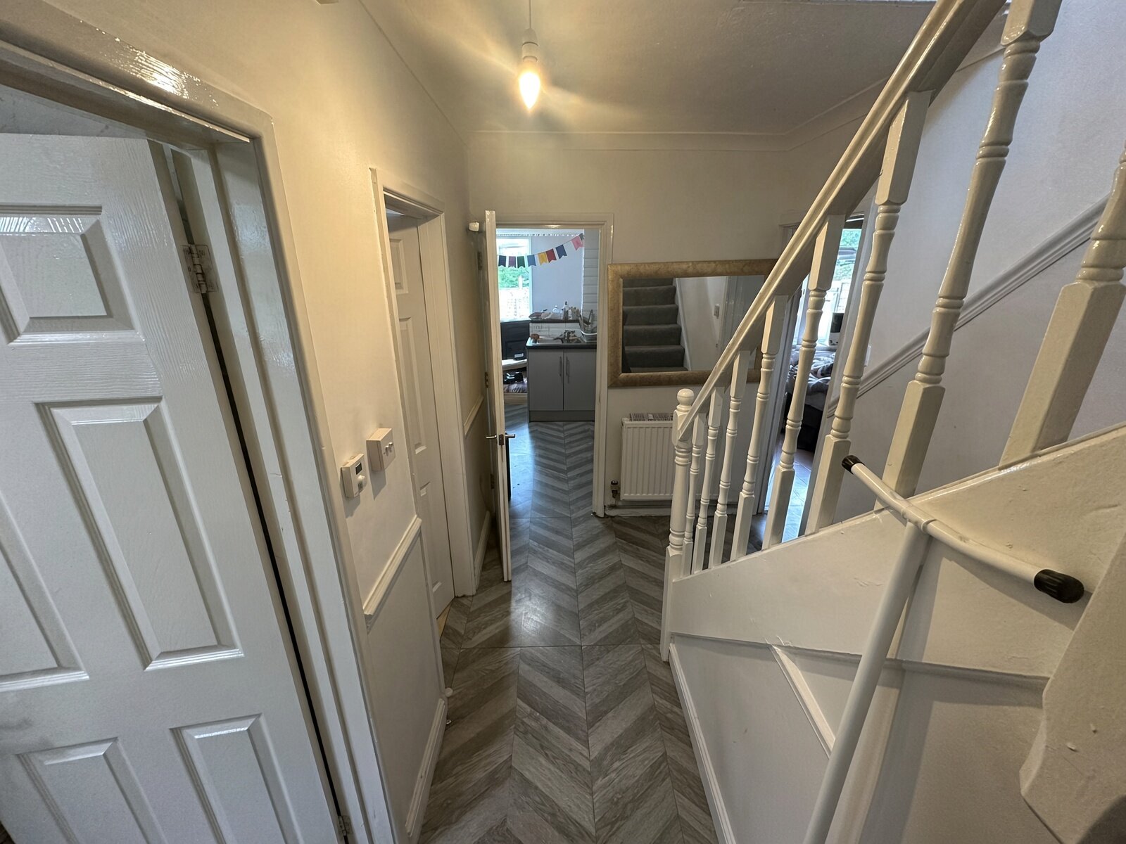 Hallway looking through to the kitchen