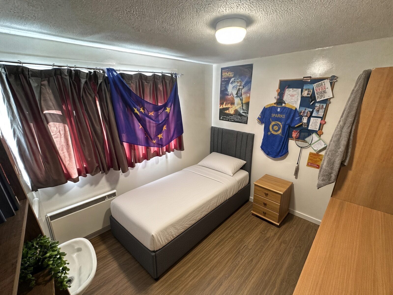 Bedroom with double bed, bedside table and window
