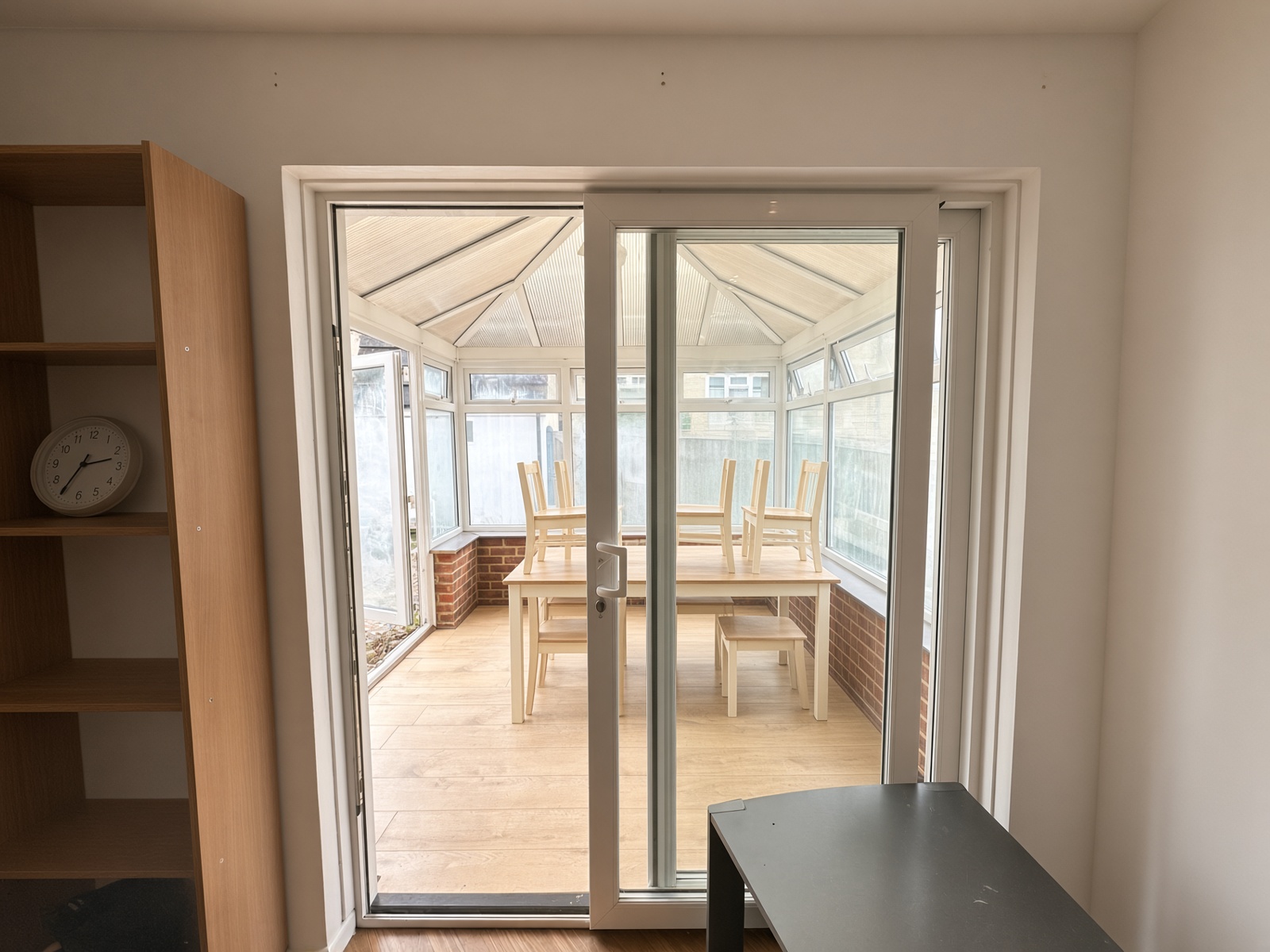 View through a sliding door into the conservatory